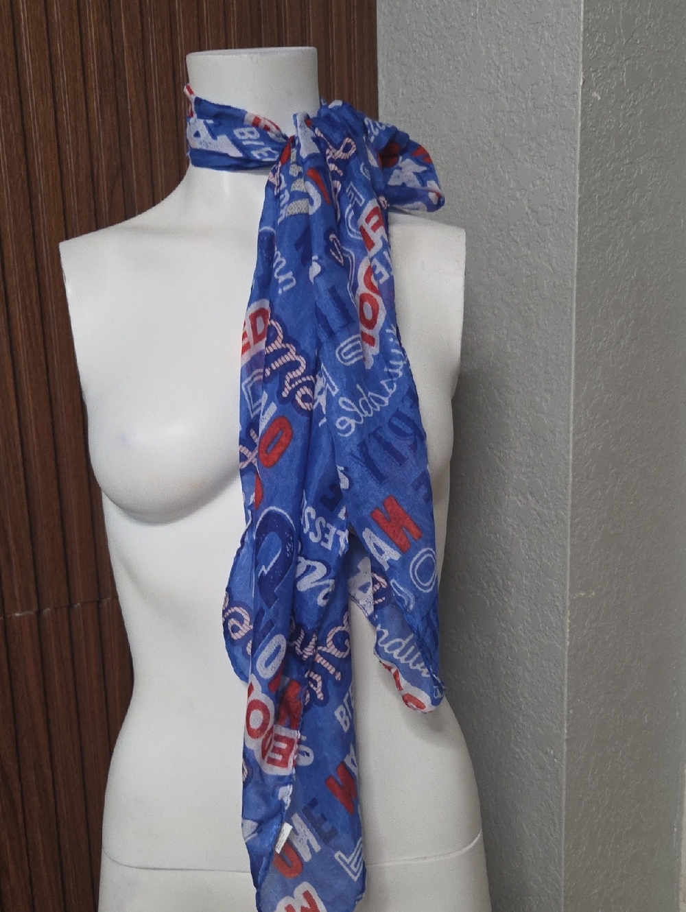 women's patriotic flag star scarf typically worn to show American pride. 